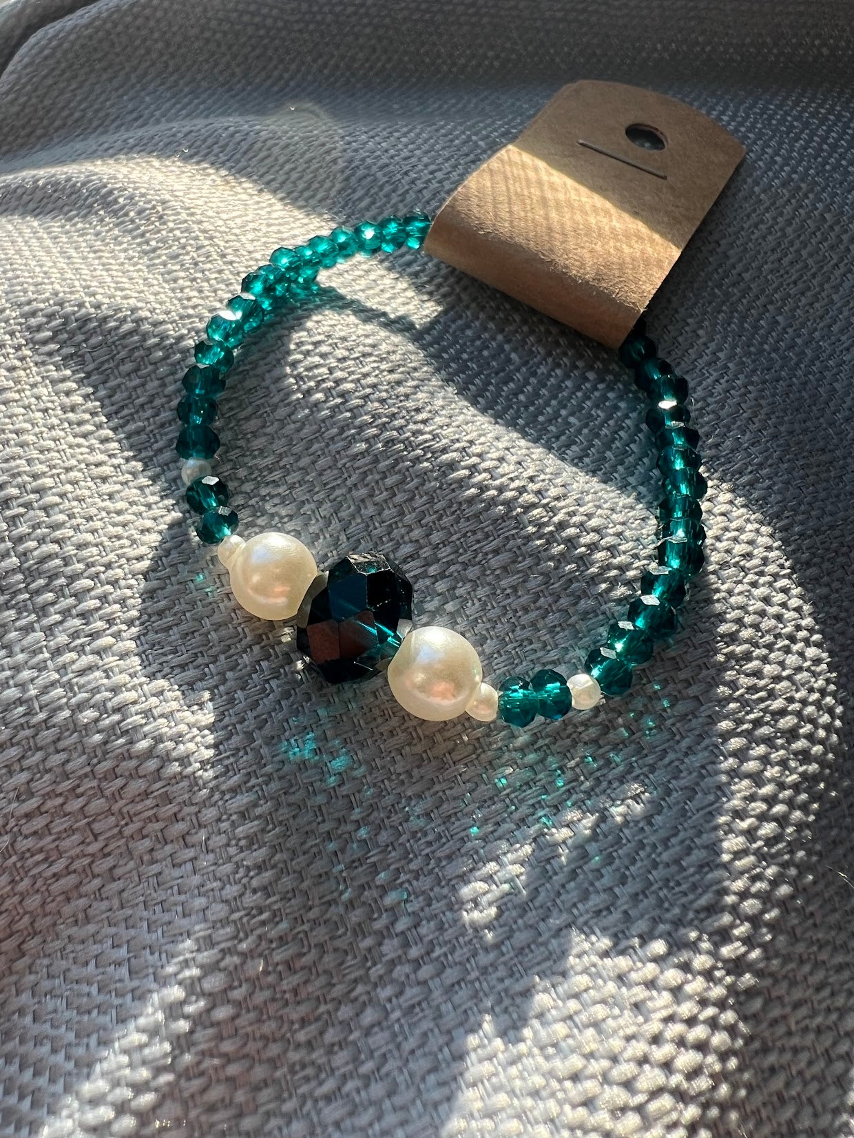 Emerald and Pearl Bracelets